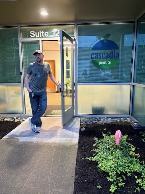 Jeremy Vrablik at the front door of Cascadia Produce's office in Auburn, WA