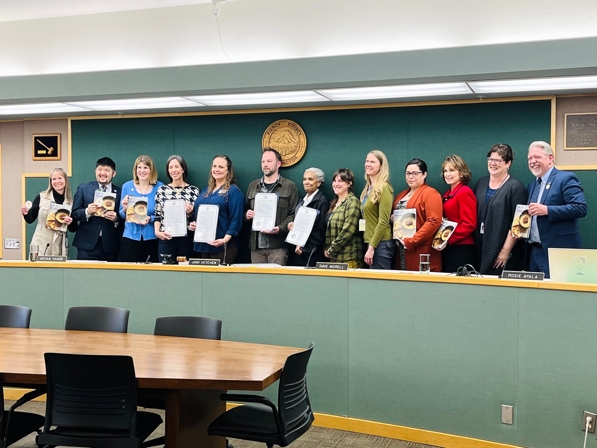 Pierce County Council presenting a food waste reduction proclamation to Cascadia Produce, 2025